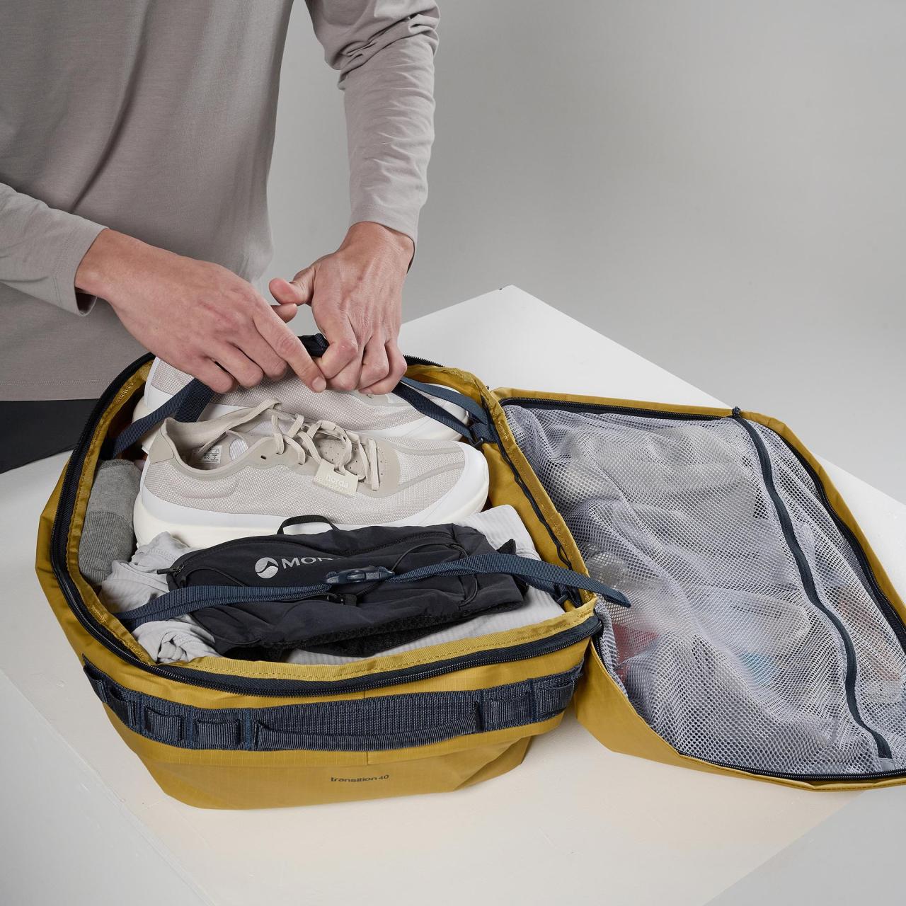 TRANSITION DUFFEL 40L-GINKGO GOLD-ONE SIZE taška žlutá